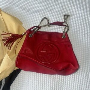 Real Gucci red handbag. Used but in good- worn condition.
